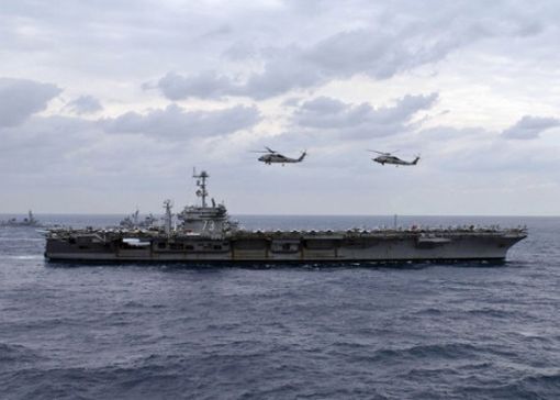 資料圖：美軍“喬治·華盛頓”號航空母艦與反潛機編隊。