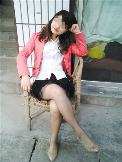 　2012年6月張貴英上傳到QQ空間的一張照片，拍攝于宜賓市金發街。今年上半年，張貴英在宜賓打工。