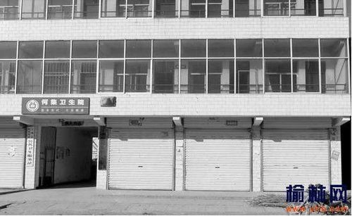 何集鎮何集衛生院大門雖然敞開,但兩層近二十間病房空無一人。記者邊瑞攝